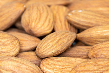 Raw Almond nuts for roasting closeup