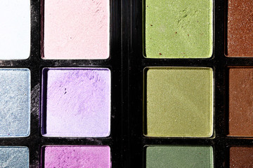 Eye shadow on a black background. Close up