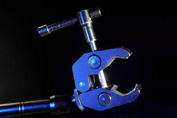small holder with lock on black background