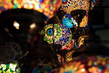 Colorful Moroccan style lanterns lamp hanging down from ceiling