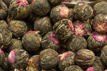 Fototapeta na wymiar Purple thistle flower dry herbal tea background