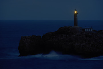Mouro island lighthouse. Santander, Spain.