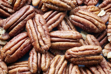 Close up picture of pecan nuts, selective focus.