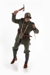 Actor in the form of a German infantryman from the times of the First World War  Posing on white...