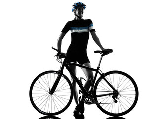 Fototapeta premium one caucasian cyclist woman cycling riding bicycle in silhouette isolated on white background
