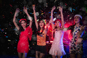 Teenagers are celebrating at the night party.