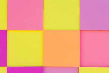 wooden panel made of multicolored squares. Abstract background