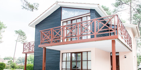 The facade of the wooden house in modern style