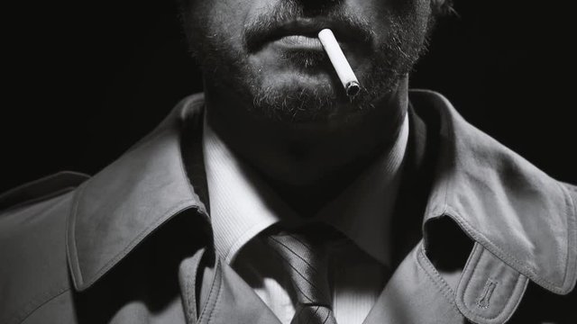 Portrait of a retro noir detective smoking a cigarette