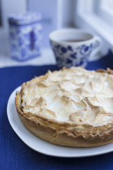 Pie with meringue and berries