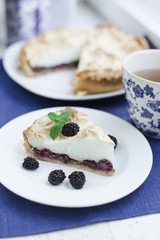 Pie with meringue and berries