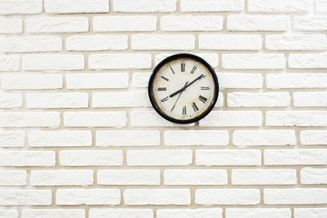 old clock on brick wall