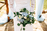 bouquet of the bride in hands