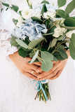 bouquet of the bride in hands