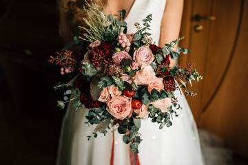 bouquet of the bride in hands