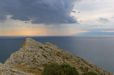 View from the top of the mountain towards the sea. Bad weather. Crimea.