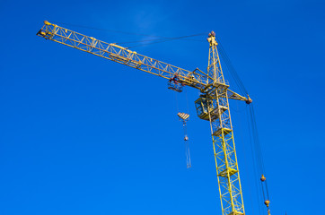 tower crane against the blue sky