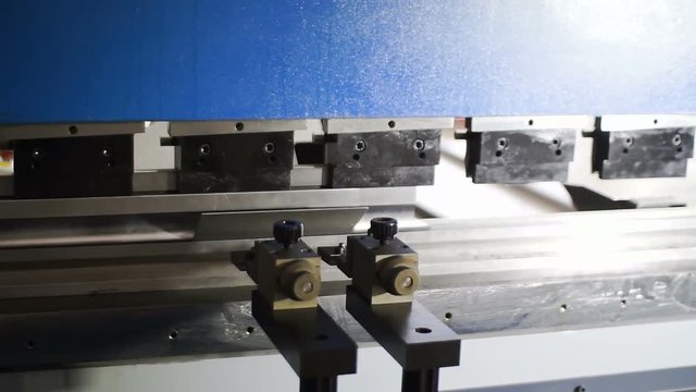 bending of a metal billet on an industrial machine