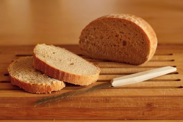 Fresh baked bread with knife