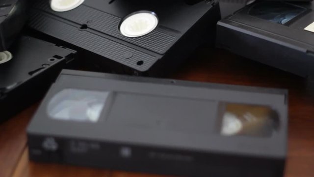 Put a Vhs cassete tape on the table