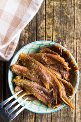 Anchovy fillets in oil.