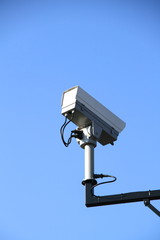 security camera on a metal pole