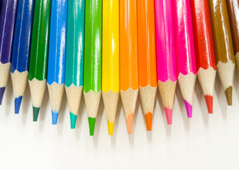 Colored pencils on a white background
