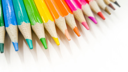 Colored pencils on a white background