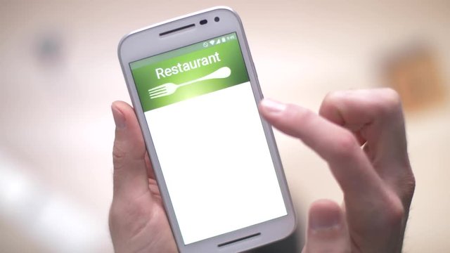 Browsing the menu of a restaurant from a smartphone device.