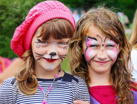 Funny little girls with painted face
