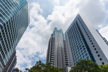 Obraz na płótnie Canvas Low angle view of modern skyscrapers in asian city
