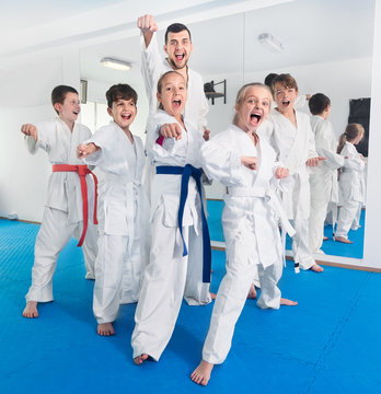Teenagers happy to attend karate class
