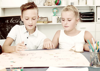 Brother with sister are playing in board game