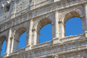 Fototapeta na wymiar Arch apertures of the Colosseum