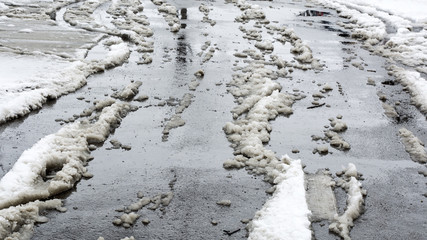 Melted snow on the road