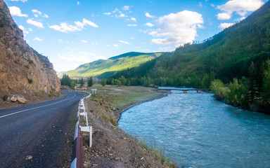 Fototapeta na wymiar Mountain landscape. The Chuya River and the Chuyskiy highway highway in the Altai Republic.