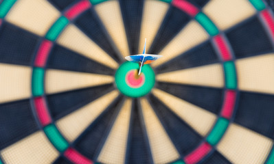 dart board with darts isolated on white