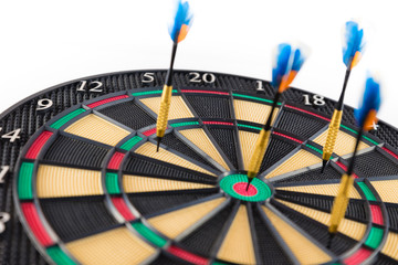 dart board with darts isolated on white