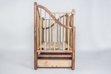 child handmade wooden bed isolated