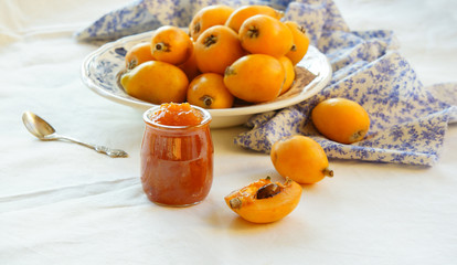 homemade loquat jam on the white background, Contre-jour light