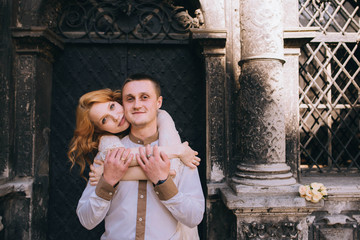 Obraz premium young and beautiful woman and man standing together outdoors