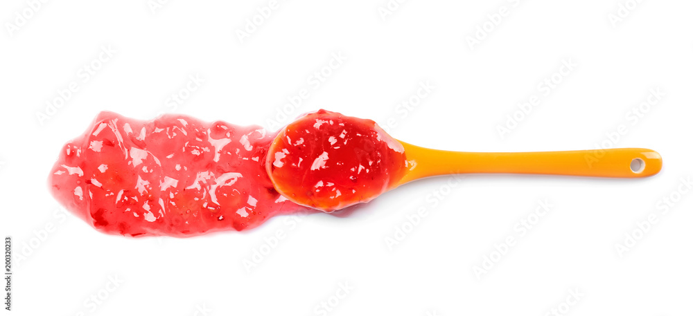 Poster Spoon with sweet jam on white background