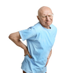 Man suffering from back pain on white background