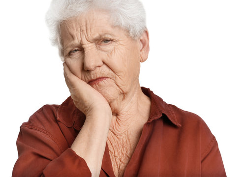 Elderly Woman Suffering From Tooth Ache On White Background