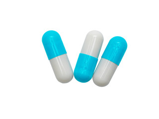 blue medical Capsule pills closeup and isolated on white background. healthy medical product concept.