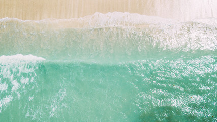 white sand and blue ocean. waves on the coast