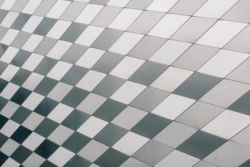 background of a modern wall of metal rhombs