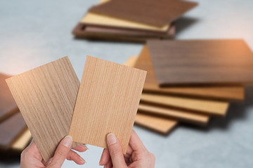 samples of material, wood , on concrete table.Interior design select material for idea.