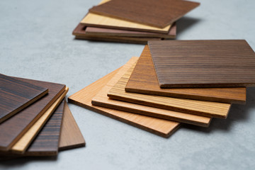 samples of material, wood , on concrete table.Interior design select material for idea.