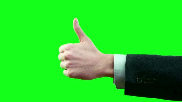 Business Man in Suit Thumbs Up and Down Set in Variations on Green Screen 4k Video Footage.